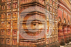 Rich decorated with terracota tiles facade of the Pancharatna Govinda Temple in Putia, Bangladesh. photo