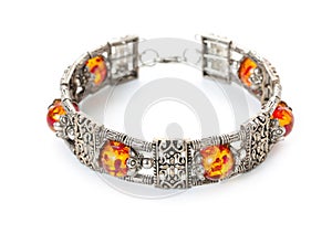 Rich decorated vintage style silver bracelet with amber. Bijouterie, imitation jewelry