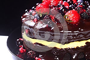 Rich and delicious chocolate cake with fresh fruit