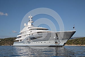 Rich - front view of five story luxury yacht on the Mediterranean Sea