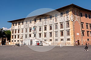 Rich ornate facade of the Palazzo della Carovana at the Piazza dei Cavalieri in the center of Pisa