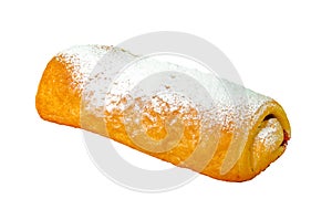 The rich ruddy roll is strewed by powdered sugar with a stuffing from dried apricots isolated on white