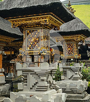 Richly decorated balinese shrines. photo