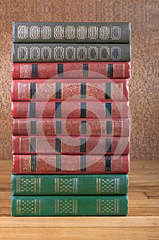 Richly decorated volumes of books with a gold lettering