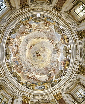 The richly painted ceiling of Basilica de la Mare de Deu dels Desemparats in Valencia, Spain photo