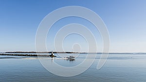 RICHMOND, CANADA - APRIL 09, 2020: fishing boat on the Fraser River sunset time in British Columbia Canada