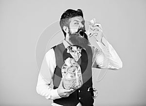 Richness and wellbeing. Security and cash money savings. Banking concept. Man bearded guy hold jar full of cash savings