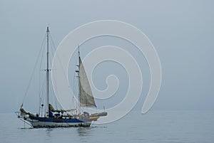 Rickety boat on calm seas