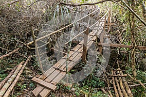 Rickety bridge on a trail to Phanoi viewpoint above Muang Ngoi Neua village, La