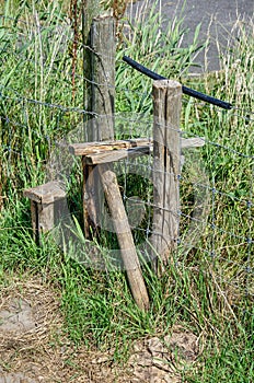 Rickety fence crossing