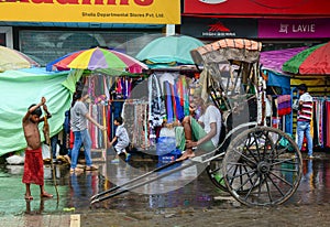 Rickshaw driver on street in Kolkata, India