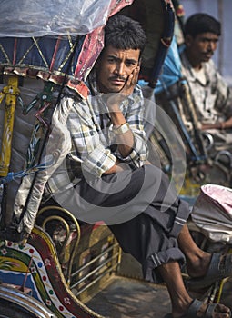 Rickshaw driver waiting for clients on Durbar square in Kathmandu