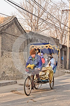 Rickshaw tour through ancient hutong area, Beijing, China