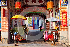 Rickshaw tricycles near the temple, Penang, Malaysia photo