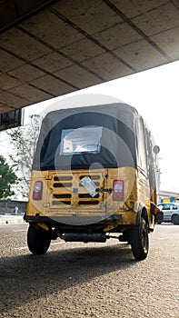 Rickshaw under bridge