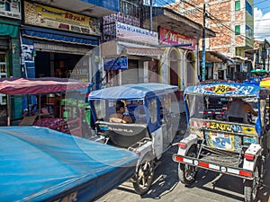 Rickshaws on a  street