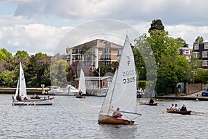 RICMOND, SURREY/UK - MAY 8 : Rowing and sailing on the River Thames between Hampton Court and Richmond on May