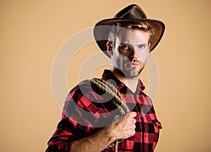 Ride any horse. Vintage style man. Wild West retro cowboy. man checkered shirt on ranch. wild west rodeo. man in hat