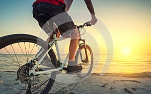 Ride on bike on the beach