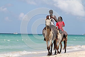 Ride horse on beach