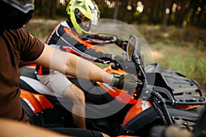 Rider on atv, view through the helmet, quadbike