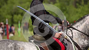 Rider don Cossack with sword on horse