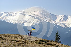 Rider among fantastic snow peaks