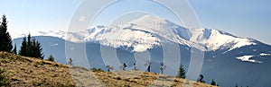 Rider among fantastic snow peaks