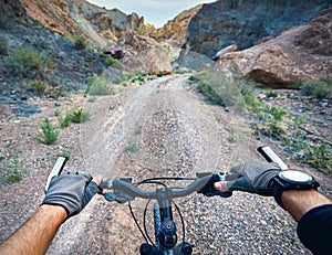 Mountain bike hands on handlebars photo