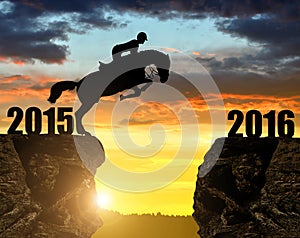 The rider on the horse jumping into the New Year 2016