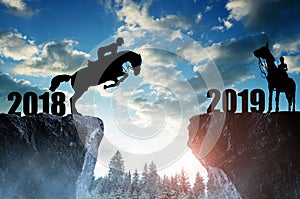 The rider on the horse jumping into the New Year 2019.