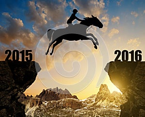The rider on the horse jumping into the New Year 2016