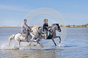 Riders on the beach