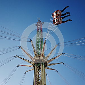 Riders on county fair ride