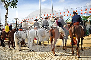 Riders at horse in the Seville Fair, feast in Spain