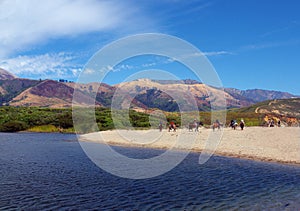 Riders in typical California landscape