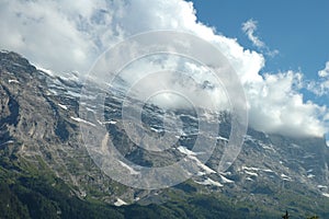 Ridge and Eiger peak in clouds nearby Grindelwald in Switzerland
