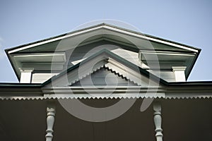 The ridge of the roof of an old house. Decoration of the roof visor in the 19th century.