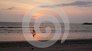 Riding a bicycle on the sea edge