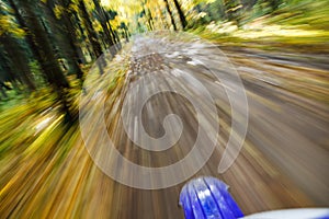 Riding dirtbike. Abstract motion blur. photo