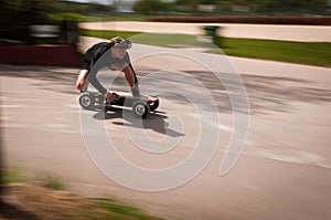 Riding fast on an electric skateboard