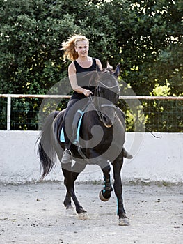 Riding girl and horse