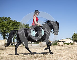 Riding girl and horse