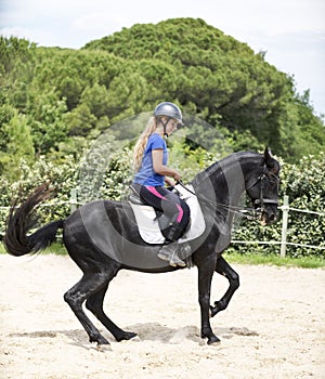 Riding girl and horse