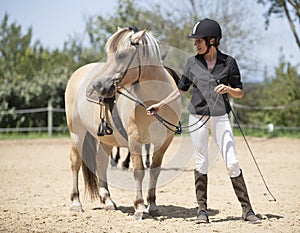 Riding girl and horse