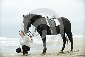 Riding girl and horse