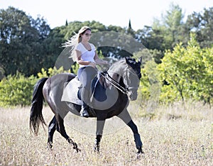 Riding girl and horse