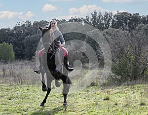 Riding girl and horse