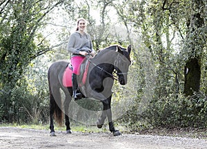 Riding girl and horse