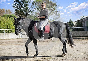 Riding girl and horse